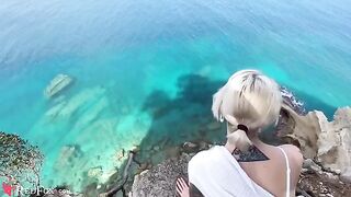 A cute girl passionately sucks dick on the beach, showcasing her skills
