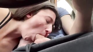 Real couple on a road trip, stopping to engage in oral play