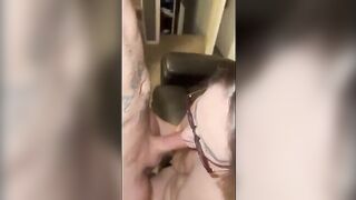 A wife fucks with a tattooed guy while her husband is at work