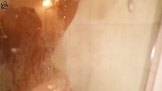 A cute young girl has fun with a big dildo in the shower