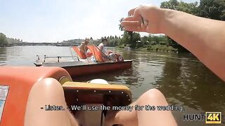 A busty woman is fucking with a hunter in the forest for money