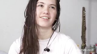 American cute girl masturbates in the bathtub with a toy, showcasing natural beauty