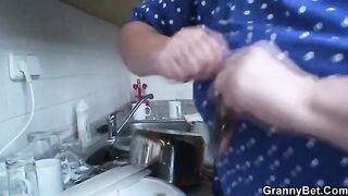 A hot old grandma is riding a young guy’s cock with her big tits