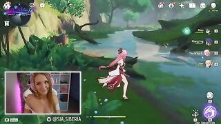 A gamer girl recreates a scene from Genshin Impact with a huge dildo