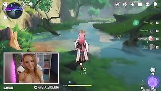A gamer girl recreates a scene from Genshin Impact with a huge dildo