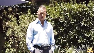 A cute girl is having fun with her boyfriend’s muscular dad by the pool