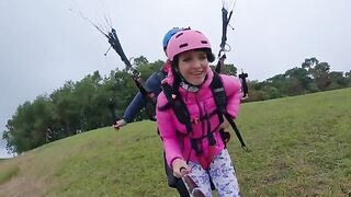 A girl squirts while paragliding 2200 m above the sea, in a daring act