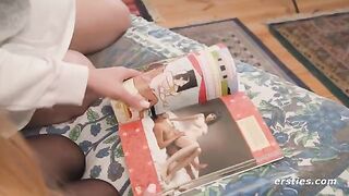 Lesbian beauties study the Kama Sutra before enjoying each other’s bodies