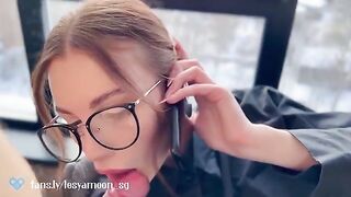 A slut talks on the phone with her husband while her friend is fucking her