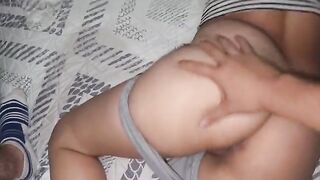 A beautiful woman has sex with her man in his pajamas, showcasing a hot Latina vibe