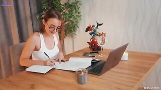 A hot girl squirts while teaching Spanish and playing with toys on her desk