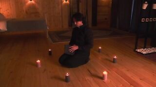 A priest exorcises a demon from a hot body of a milf