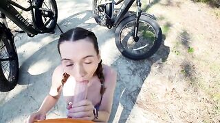 Petite cyclist takes a big tourist's cock in the forest in POV style