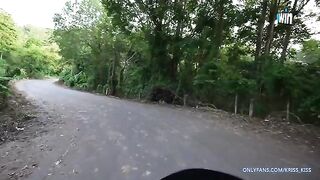 A sexy girl has her first ride on a motorbike with a stranger in the jungle