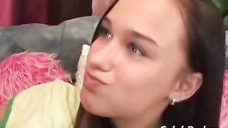 A pretty baby has sex with her adult boyfriend on the couch