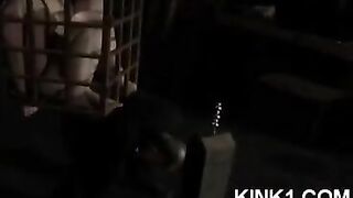 The slave in the cage fulfills all the orders of his master