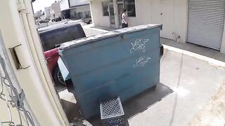 Girl has sex behind the garbage tank, unaware of being photographed