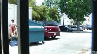 Girl has sex behind the garbage tank, unaware of being photographed