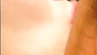 A cumshot on the face of a girlfriend near the pool