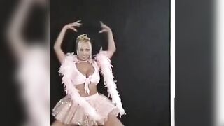 A sexy Russian is dancing and exciting those around her with erotic moves