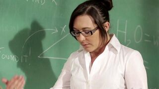 A girl is having fun with her lesbian teacher right on the table