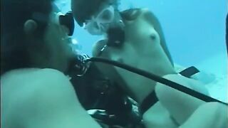 A man has sex with a woman with a hairy pussy under the water