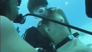 A man has sex with a woman with a hairy pussy under the water