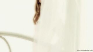 The cutie masturbates herself with skilful fingers, excitingly moaning