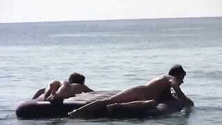 A girl showed her body on the beach without clothes