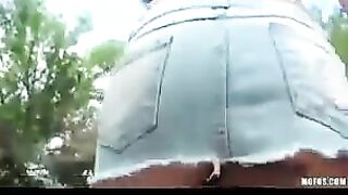 Hot brunette babe masturbating on the street for a camera
