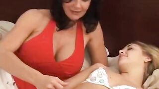 Strap-on sex with lesbians in the bedroom