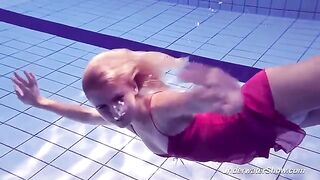 Babe Helen has a swim in the pool without any clothes