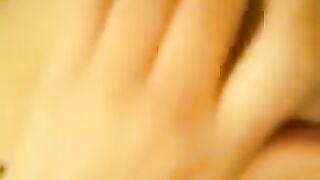 A beautiful girl plays with her pussy and gets cum on her face