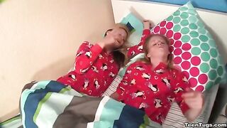Two cute sisters share a cock while jerking, giving an amazing show