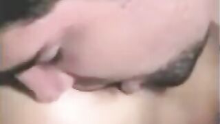 A guy fucks a girl with a strapon and another girl fingers him