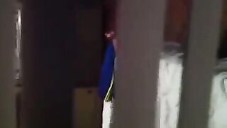 A man shoots a hidden camera as his neighbors have sex