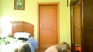 A man peeps at his home with a hidden camera