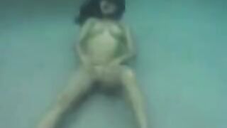 Underwater sex adventure with busty brunette beauty in ocean