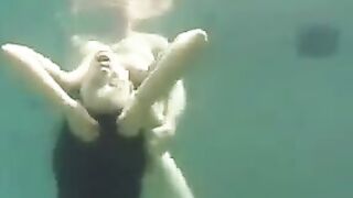 Underwater sex adventure with busty brunette beauty in ocean
