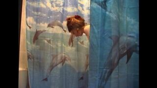 The guy secretly shoots his naked wife in the bathroom with a camera