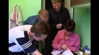 A Russian mom is getting fucked by four guys at once