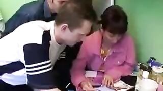A Russian mom is getting fucked by four guys at once