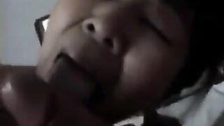 Chinese beauty practices her blowjob skills on an adult man