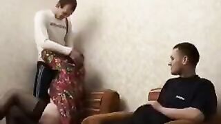 A mature woman fucked by her son and his friend in this hot video