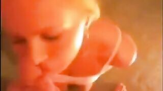 A blowjob at home ends with a cumshot on the face