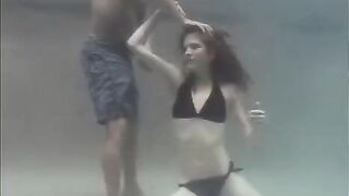Redhead beauty makes love in the swimming pool