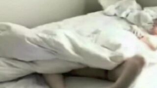 A man masturbates in the bedroom, not realizing there's a camera