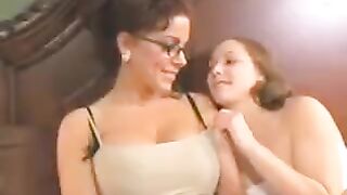 A mother introduces her young daughter to lesbian sex