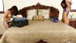 Asian girl gets her pussy eaten by a brunette in bed