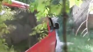 The man squeezed tits of a girl near a car and fucked her hard